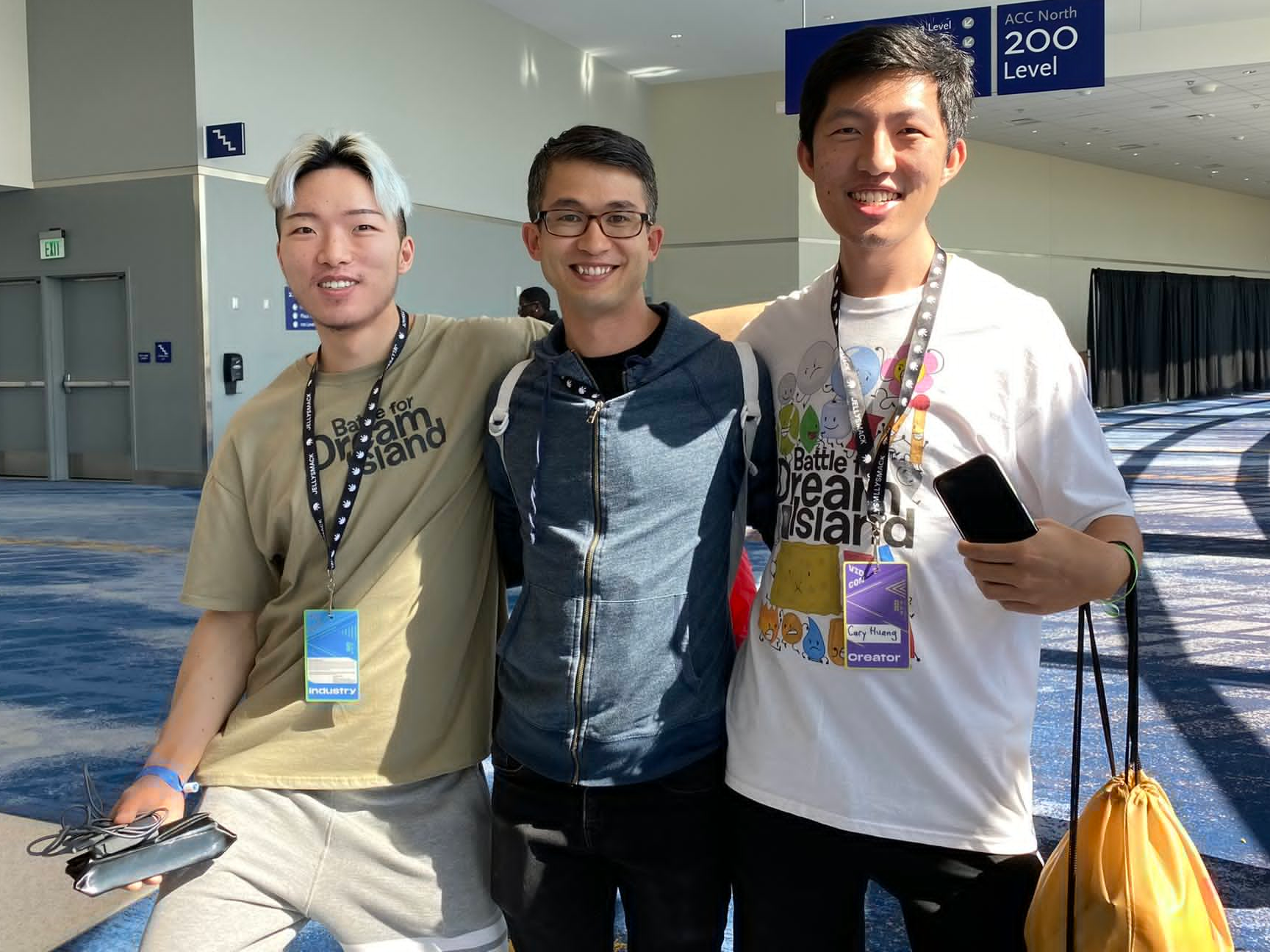 Cary and Michael Huang, with Alan Becker at VidCon 2023.